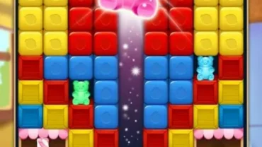 A screenshot of the gameplay in Hello Candy Blast, showing colorful candy blocks.