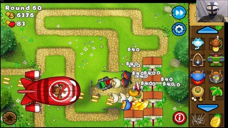 Example of Upgrading towers in Bloons TD 5.