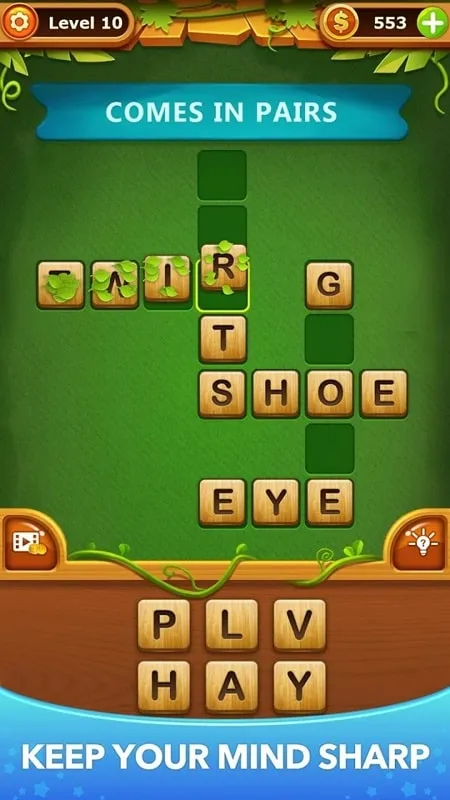 In-game screenshot highlighting the hint button and its function in revealing letters.