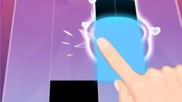 Piano Tiles 2 gameplay on a mobile phone.